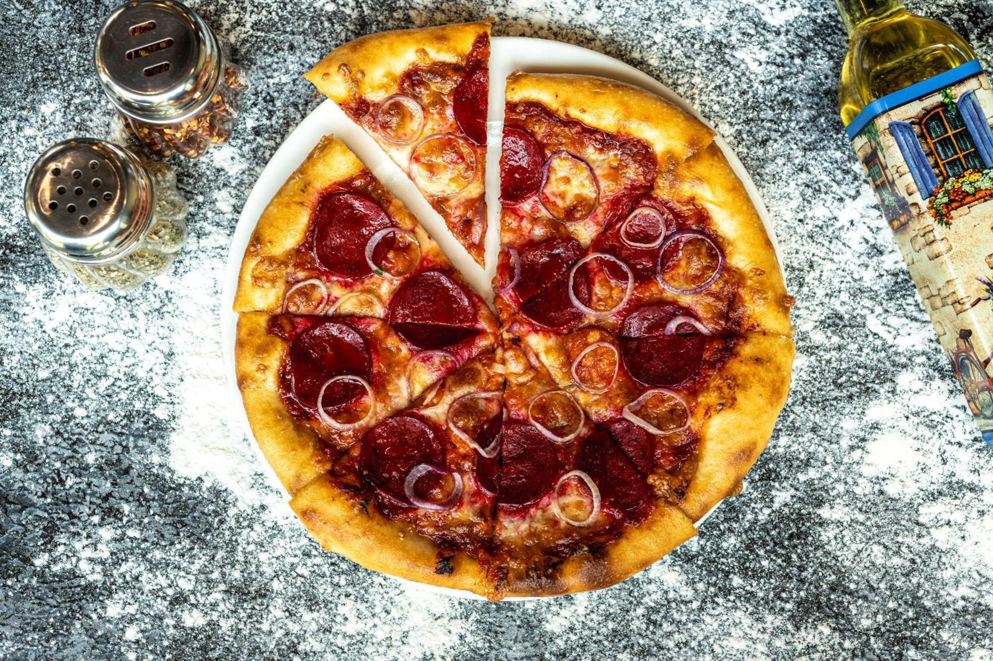 하얏트 플레이스 구르가온 우디오그 비하르 호텔 외부 사진 A pepperoni pizza